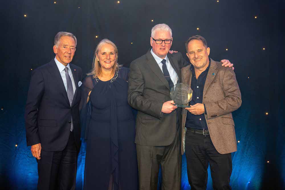 Raymond Duncan (second from right), the Group Compliance, Operations & Procurement Manager at Hastings Hotels was named Inspirational ESG Leader of the Year at the 2024 Inspirational Leader Awards organised by HOSPA, the Hospitality Professionals Association. He is pictured with Jane Pendlebury CEO HOSPA, Harry Murray HOSPA President, and Jason Simpson CEO of category sponsor RAW Charging.